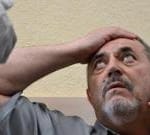 One anti-war critic fined, another held as Russia clamps down on dissent