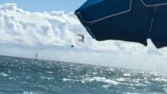 Watch: Paraglider survives 500ft drop into ocean Watch: Paraglider survives 500ft drop into ocean