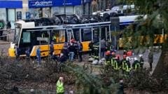 Tram derails in Milan, leaving one dead and dozens injured Tram derails in Milan, leaving one dead and dozens injured