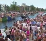 Crowds line Amsterdam’s canals for Pride boat parade